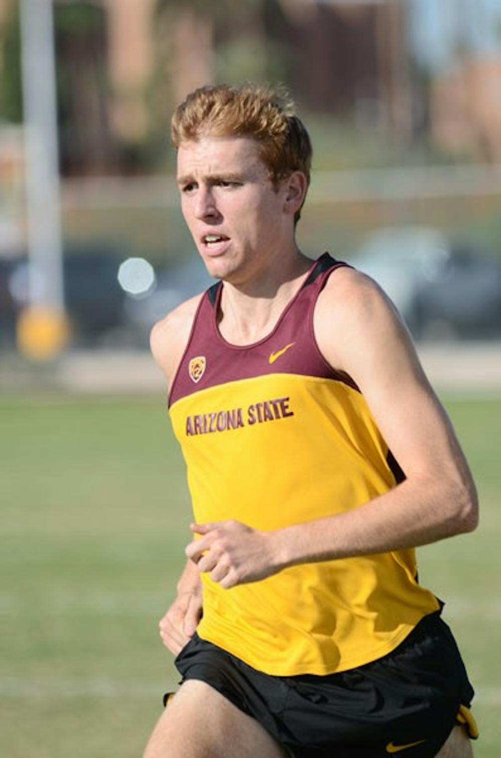Redshirt sophomore Garrett Baker-Slama works on his stride during an ASU cross-country practice on Oct. 3. (Photo by Aaron Lavinsky)
