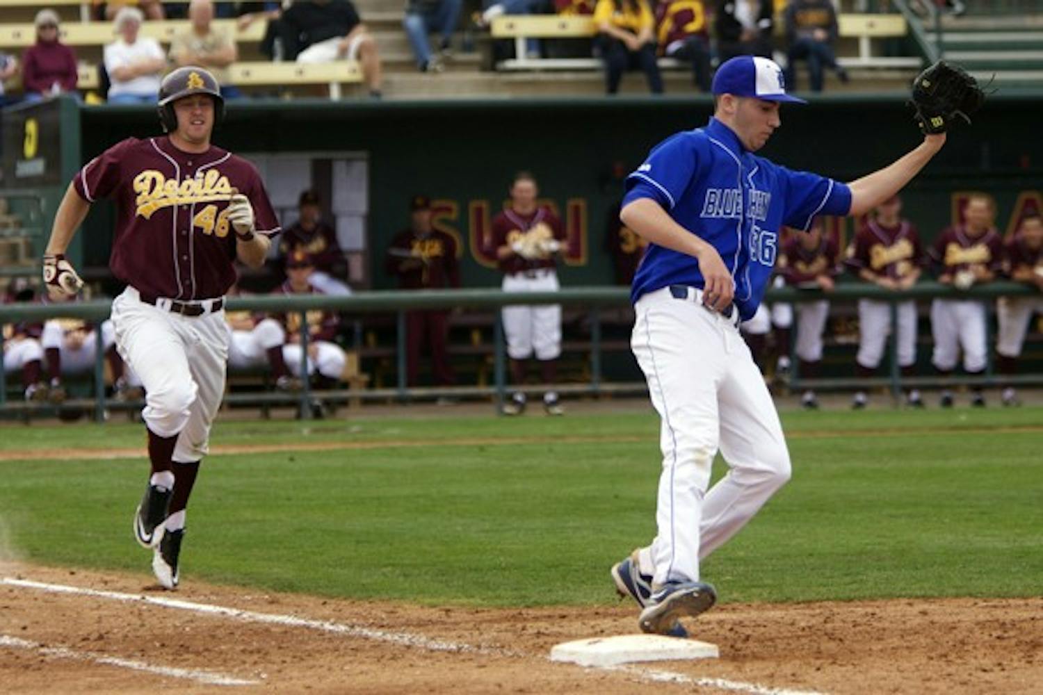 Back on the Base Paths: ASU junior outfielder Andy Workman sprints to first base against Delaware on Feb. 26 in Tempe. It was Workman’s first game back after missing the entire 2010 season with a foot injury. (Photo by Scott Stuk)