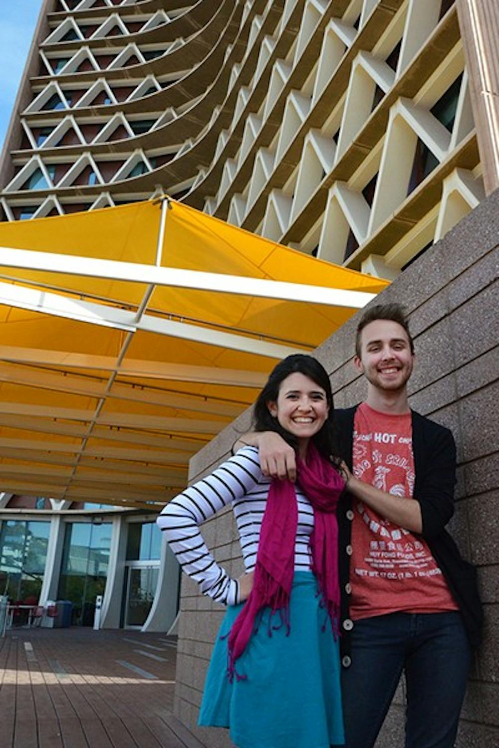 Co-chair Lauren Zack, senior psychology and English double majors, co-founded the Gender Inclusive Housing Action Committee at ASU with Christian Sandoval (not pictured). Zack poses with political science freshman Brandon Marks, a supportive member of the GIHAC, in front of Manzanita Hall on ASU's Tempe campus. (Photo by Rachel Nemeh)