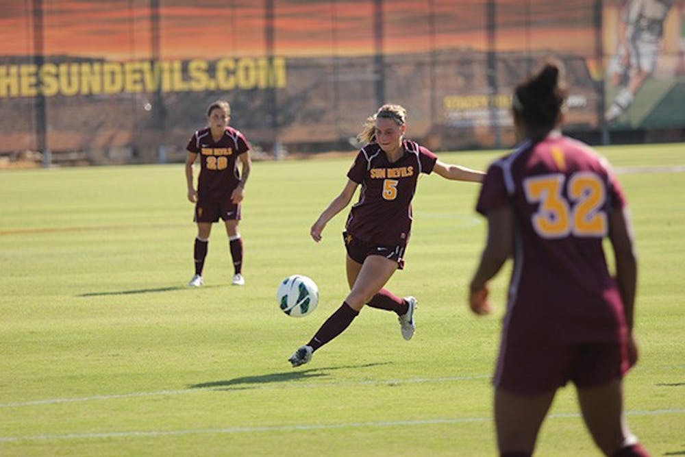 Sophomore midfielder Tommi Goodman winds up to pass the ball at a home game in Tempe. 