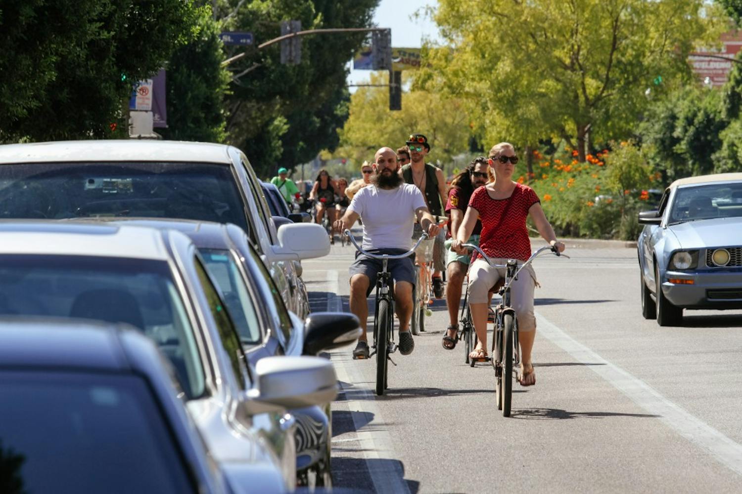 Bike-riders use bike lanes on Mill Avenue in Tempe, Arizona, on Oct.  1, 2016