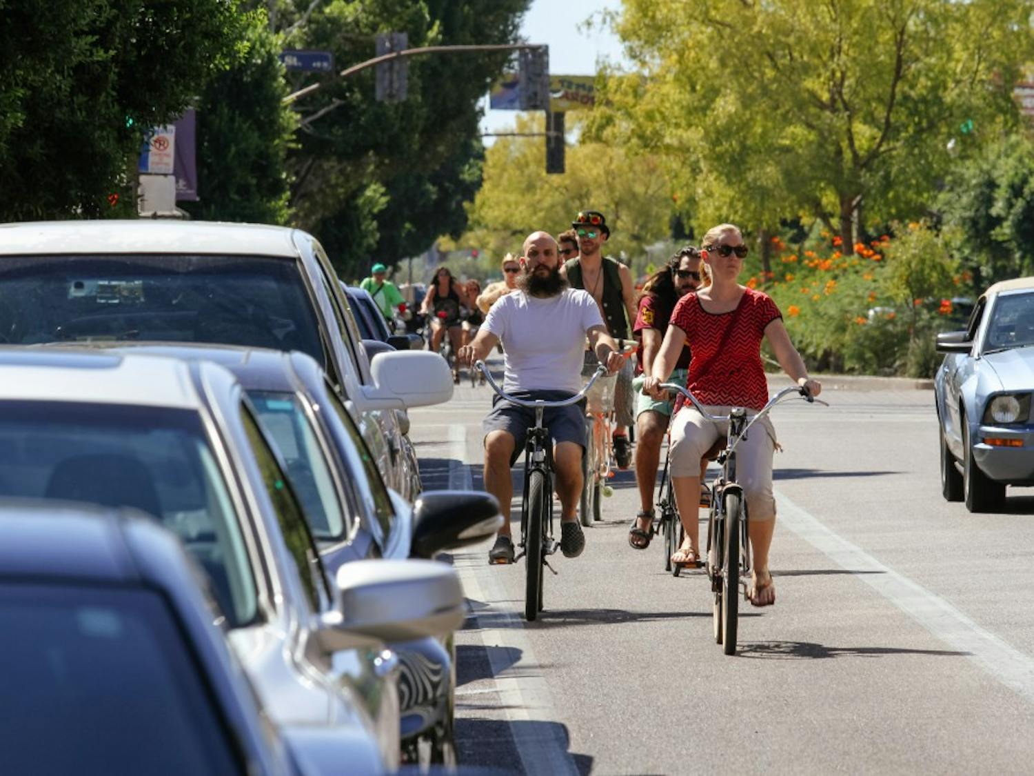 Bike-riders use bike lanes on Mill Avenue in Tempe, Arizona, on Oct.  1, 2016
