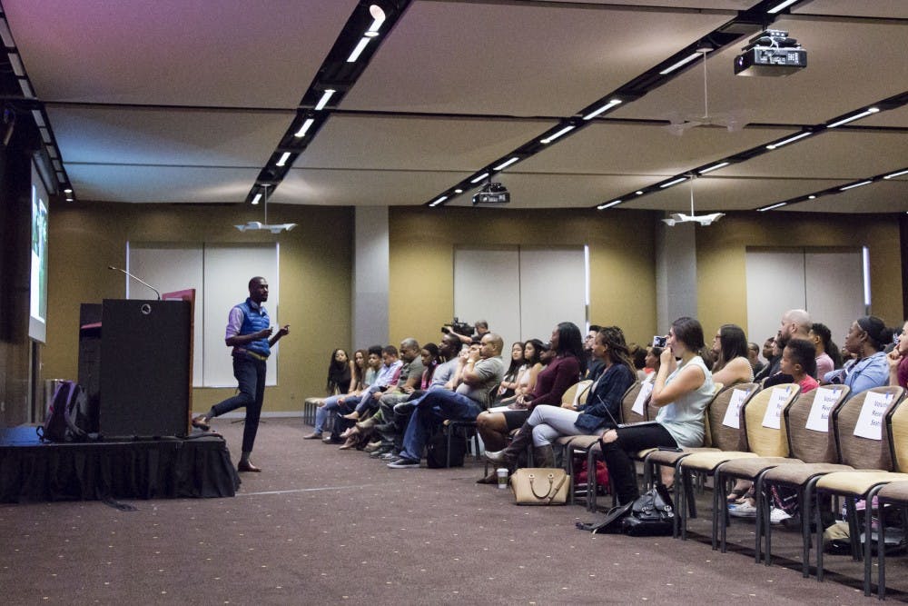 DeRay Mckessen, a civil rights activist, speaks to students at Arizona State University about the Black Lives Matter movement, Monday, March 21, 2017.
