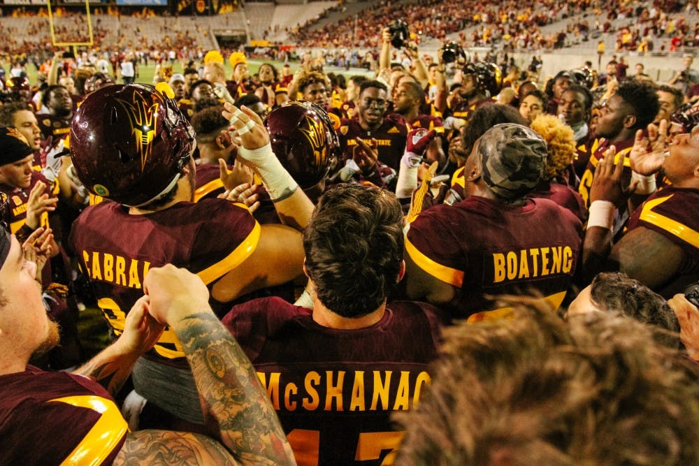 The ASU football team celebrates after winning a football game versus the California Golden Bears, 51-41, in Tempe, Arizona, on Saturday, Sept. 24, 2016.