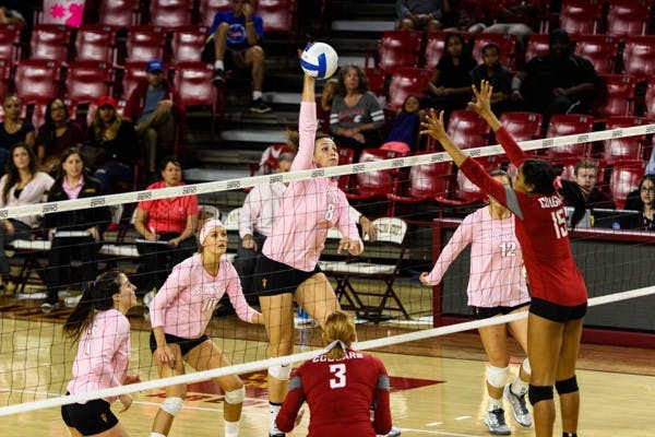 Junior middle blocker Whitney Follete spikes in the fourth set during the match vs Washington State on Sunday, Oct. 19th, 2014, at Wells Fargo Arena in Tempe. The Sun Devils would rally from two sets down to beat the Cougars 3-2. (Photo by Daniel Kwon)