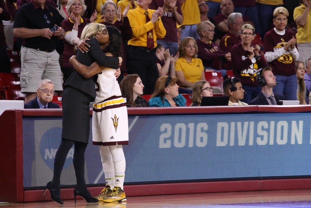 Senior guard Elisha Davis hugs Coach Charli Thorne as she leaves the court for the last time after fouling out of the NCAA Women's Basketball game against Tennessee on Sunday, March 20, 2016, in the Wells Fargo Arena. 
