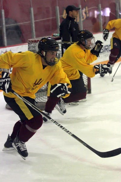GREAT EXPECTATIONS: Members of the ASU club hockey team skate sprints during practice on Tuesday. Despite losing a core group of starters from last year, the Sun Devils are confident they can reload for the 2011-12 season. (Photo by Lisa Bartoli)