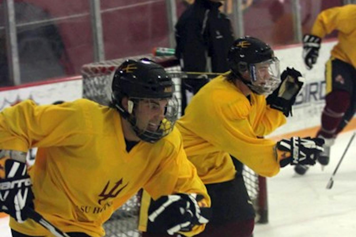 GREAT EXPECTATIONS: Members of the ASU club hockey team skate sprints during practice on Tuesday. Despite losing a core group of starters from last year, the Sun Devils are confident they can reload for the 2011-12 season. (Photo by Lisa Bartoli)