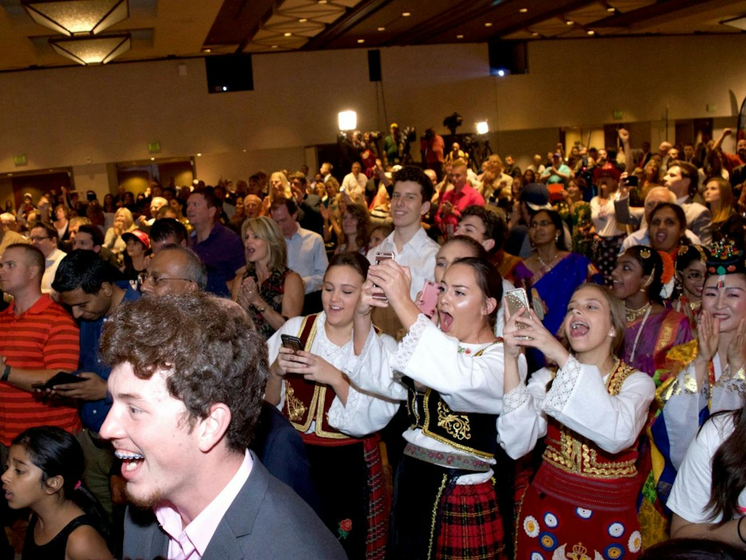 Supporters react during a viewing party for the Arizona State GOP at the Hyatt Regency Hotel on Tuesday, Nov. 9, 2016.