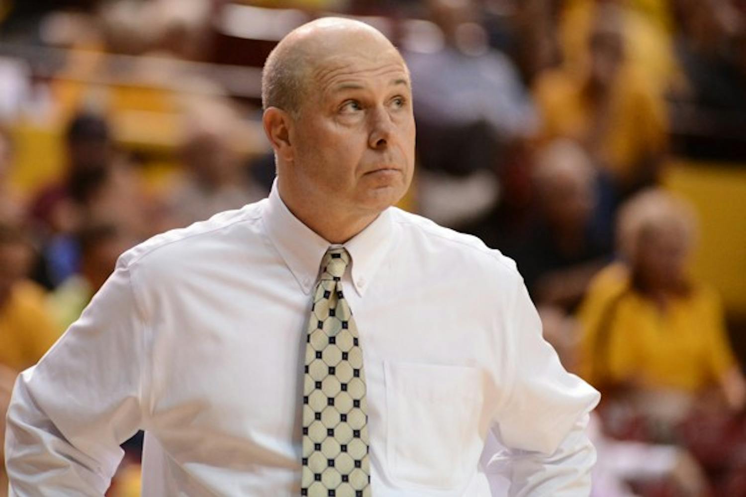 ASU head coach Herb Sendek watches as Eric Jacobsen shoots free throws in the second half. (Photo by Aaron Lavinsky)