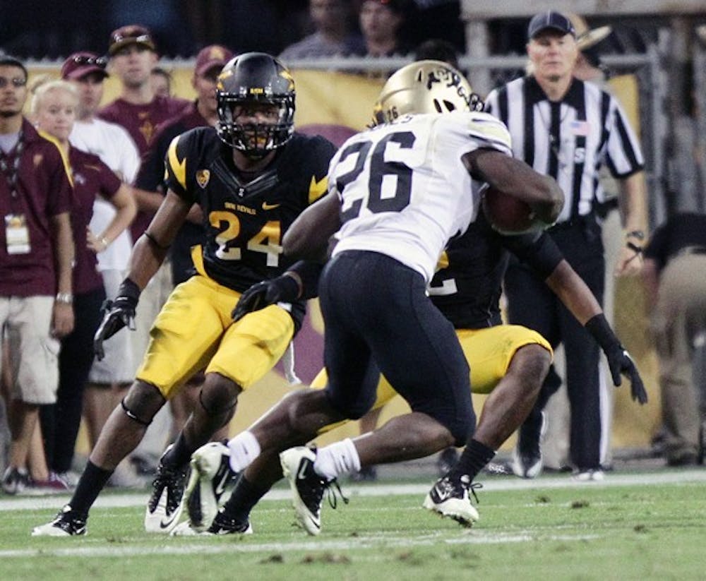 Osahon Irabor prepares to make a tackle in a game against Colorado on Oct. 29, 2011. Irabor has been the most impressive corner this spring, according to coach Todd Graham. (Photo by Beth Easterbrook)