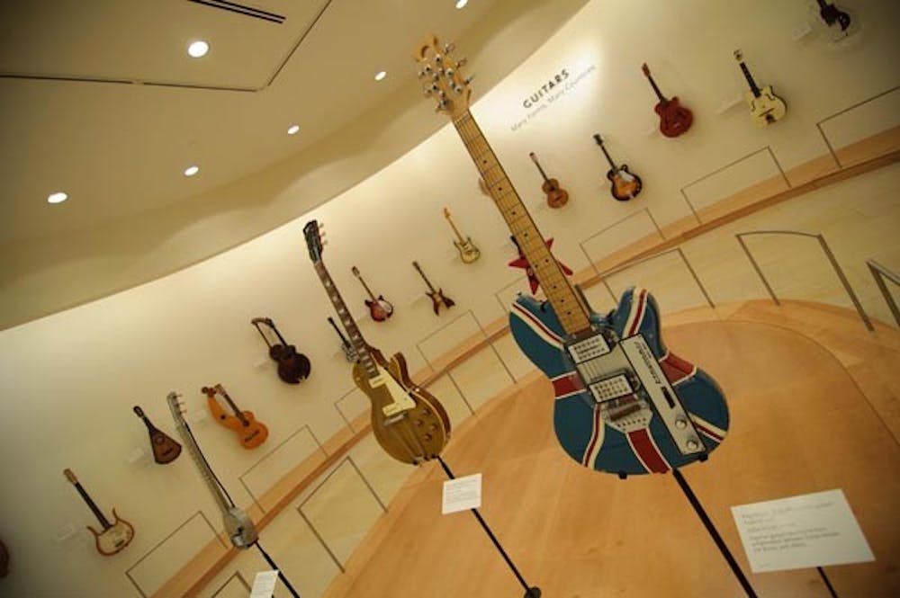 ROCKIN' INTERNSHIP: A collection of artist's guitars on display at the Musical Instrument Museum in north Phoenix. This fall the MIM will be starting four new internships for students from different schools, including ASU. (Photo by Aaron Lavinsky)