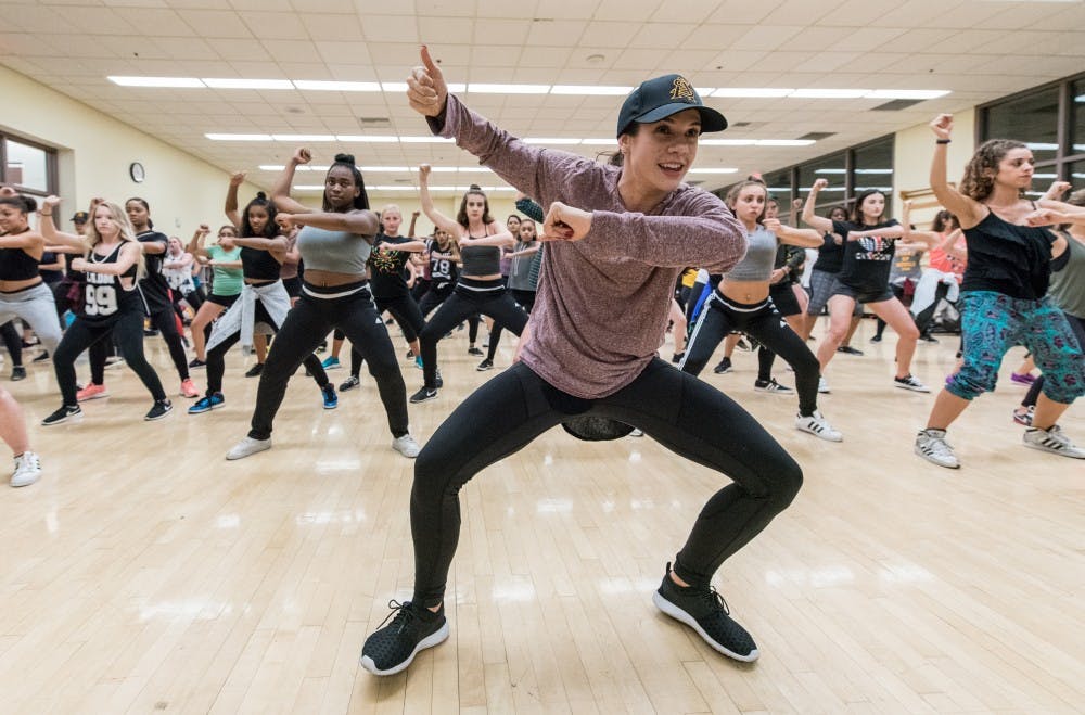 Brittany Hannish, a 2013 ASU graduate, teaches choreography to the Hip-Hop Coalition class being held in the Tempe Sun Devil Fitness Center on Tuesday Aug. 23, 2016. According to their club description, the Hip-Hop Coalition is a club with all levels of talent, which promotes all styles of hip-hop through freestyling and choreography.
