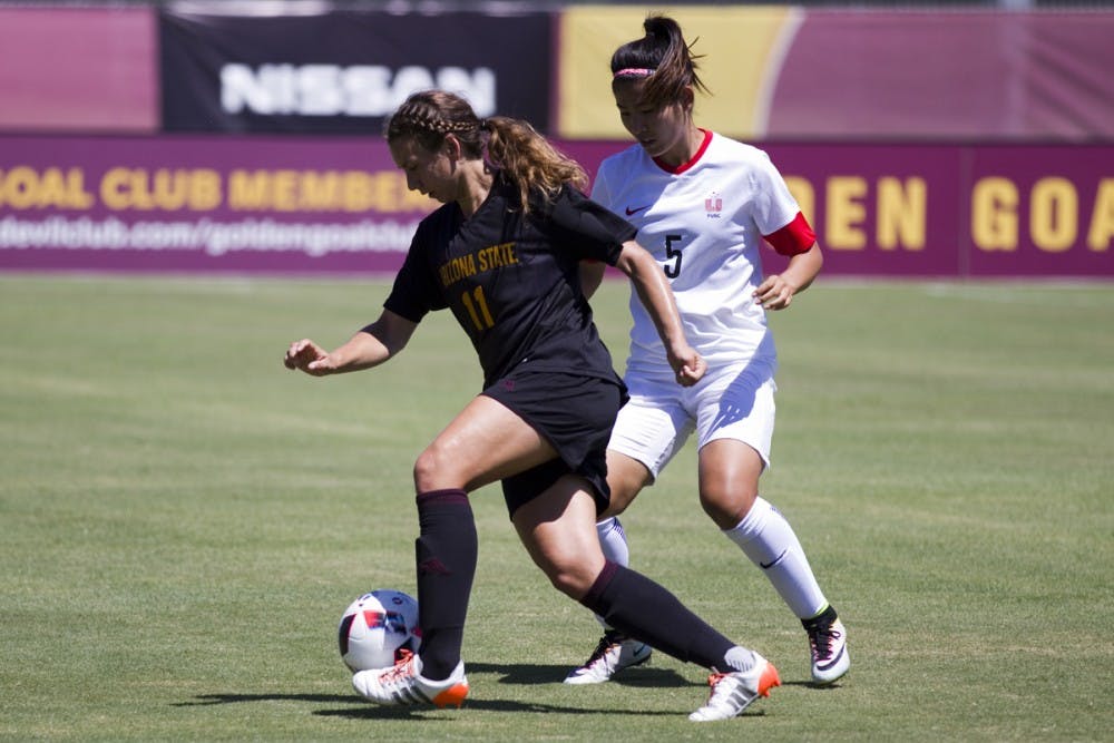 Freshman forward Olivia Hernandez looks to break away from the Beijing Normal defender in the 0-1 exhibition loss versus Beijing Normal  in Sun Devil Soccer Stadium in Tempe, Arizona, on Saturday, August 27, 2016. 