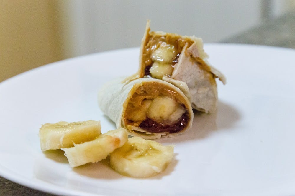The banana burrito is a cheap and easy-to-make snack made of four main ingredients: bananas, jam, peanut butter and a tortilla. You can also add Nutella or strawberries to make the burrito even better. (Daniel Kwon/The State Press)