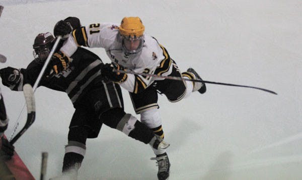 ASU defender Ryan Clark (21) knocks a Texas A&M player against the wall during the Sun Devils’ 13-0 win over the Aggies on Sept. 20. (Photo by Kyle Newman)
