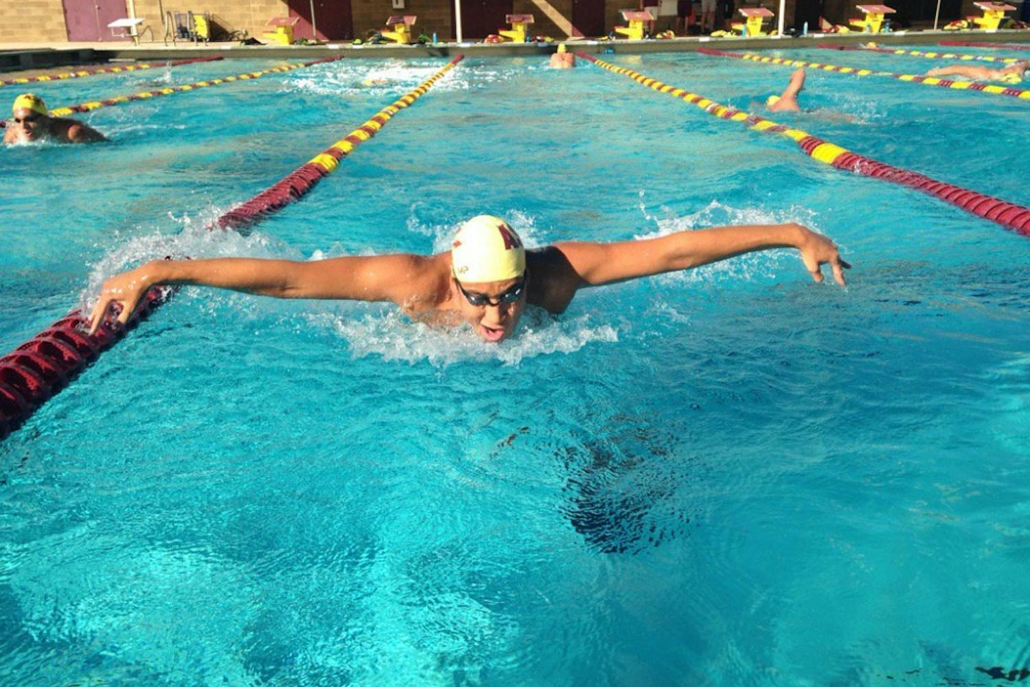 Patrick Park performs the butterfly stroke during practice on Thursday, Nov. 10, 2016.