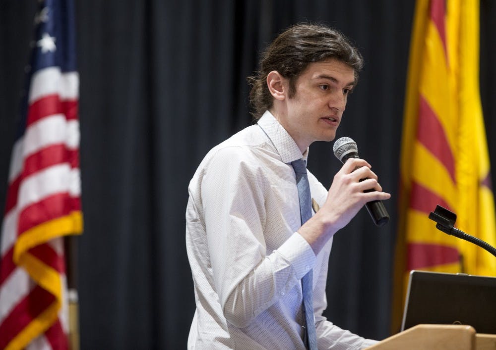 ASU graduate social justice major Petrit Gashi introduces speakers during a west campus event called "Global Refugee Crisis: A Community and Student Forum on Refugees" on Thursday, March 16, 2017.