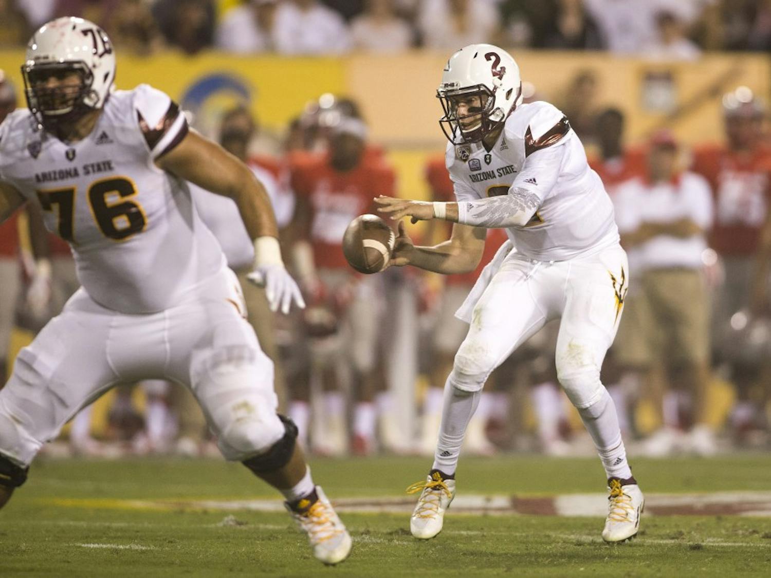 Redshirt senior quarterback Mike Bercovici takes a snap against New Mexico on Friday, Sept. 18, 2015, at Sun Devil Stadium in Tempe.