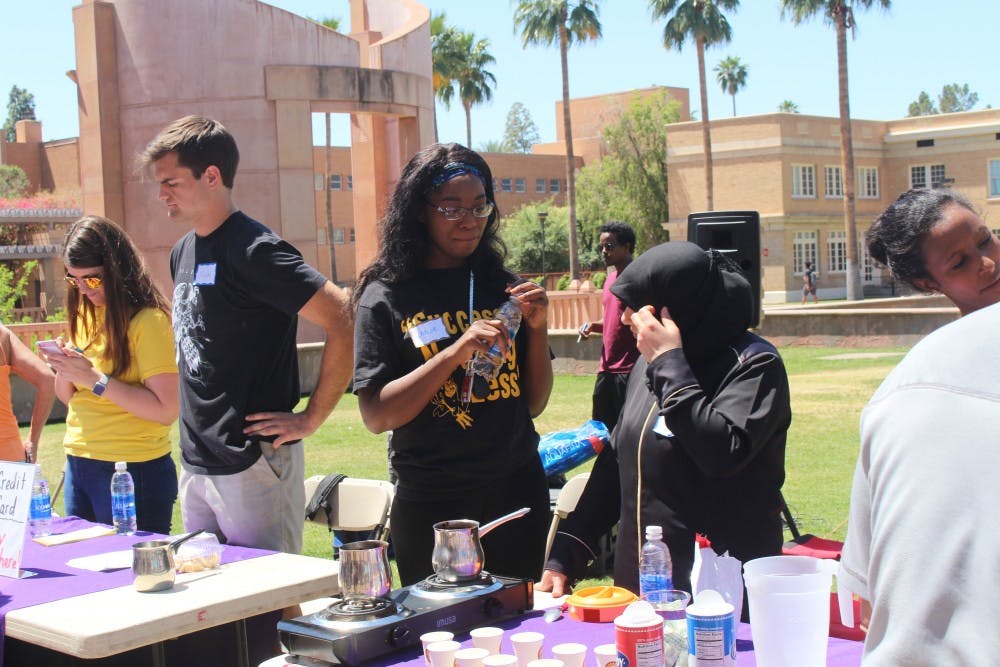 Volunteers at the bake sale put on by the Refugee Alliance&nbsp;sell baked goods&nbsp;on Hayden Lawn at ASU's Tempe campus on Tuesday, April 18, 2017.