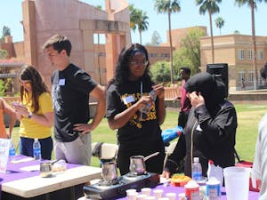 Volunteers at the bake sale put on by the Refugee Alliance&nbsp;sell baked goods&nbsp;on Hayden Lawn at ASU's Tempe campus on Tuesday, April 18, 2017.