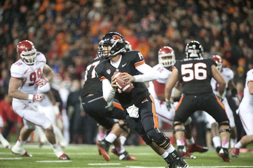 NEIL ABREW | The Daily Barometer
Oregon State junior quarterback Cody Vaz scrambles out of the pocket during the Beavers’ 21-7 win over Utah on Oct. 20. (Photo courtesy of Neil Abrew / The Daily Barometer)