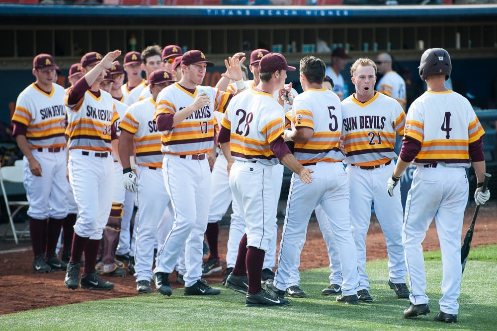Senior first baseman Joey Bielek (5) returns to the dugout after hitting a two-run home run to take the lead against Clemson on Friday, May 29, 2015, at Goodwin Field in Fullerton, California. The Sun Devils defeated the Tigers 7-4.