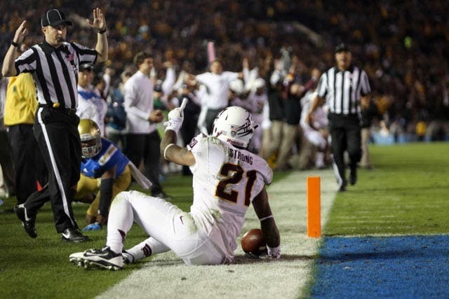 Redshirt sophomore wide recieve Jaelen Strong looks to the referee to confirm his touchdown against UCLA in Pasadena, Calif. ASU defeated the Bruins 38-35 and clinched a spot in the Pac-12 championship. (Photo by Dominic Valente.)