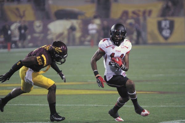 Redshirt sophomore defensive back Deantre Lewis (3) lowers his shoulder to tackle Utah senior wide receiver Reggie Dunn during ASU’s 37-7 victory over Utah on Sept. 22. (Photo by Vince Dwyer)
