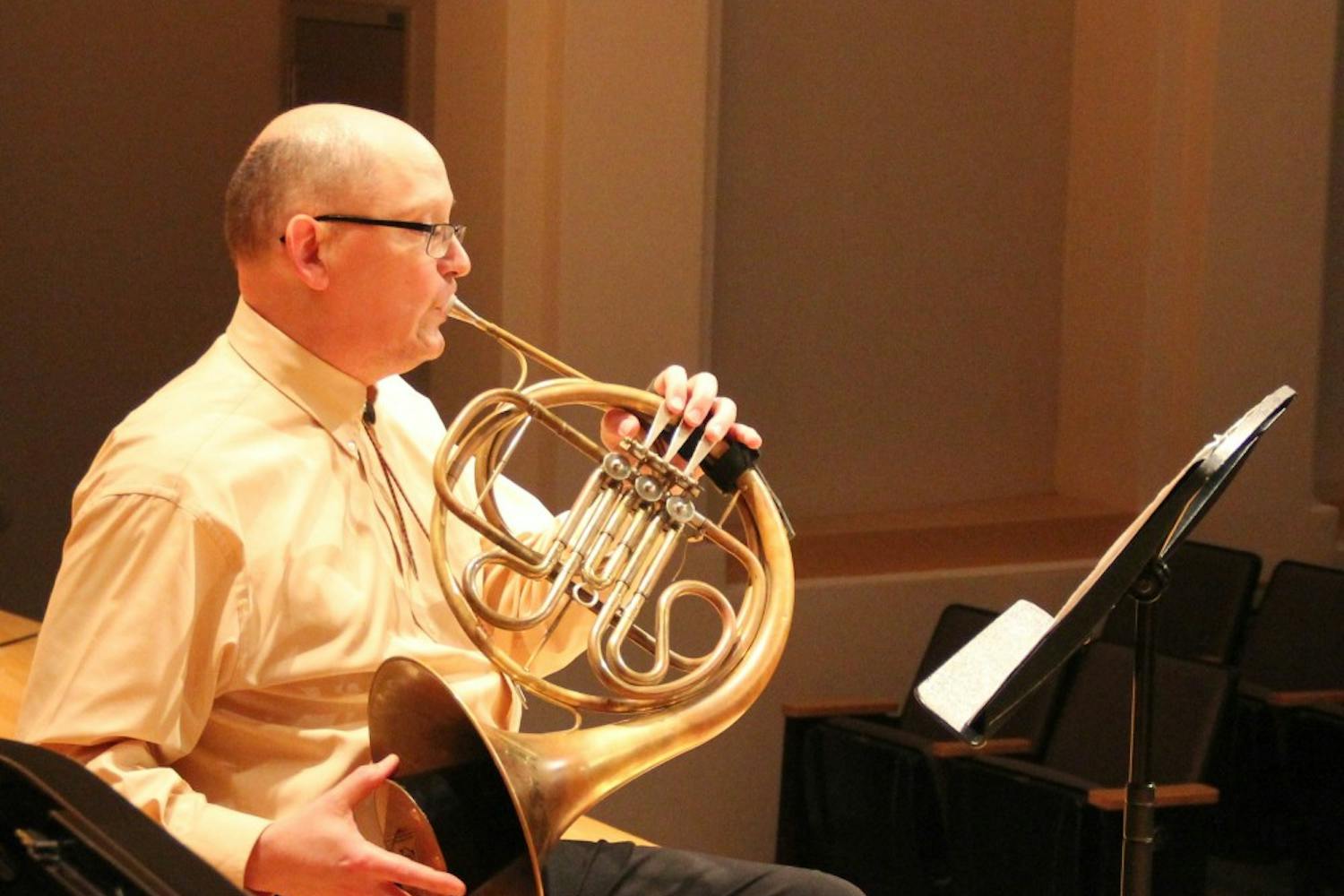 ASU professor John Ericson performing a song on the french horn in Spring 2016.