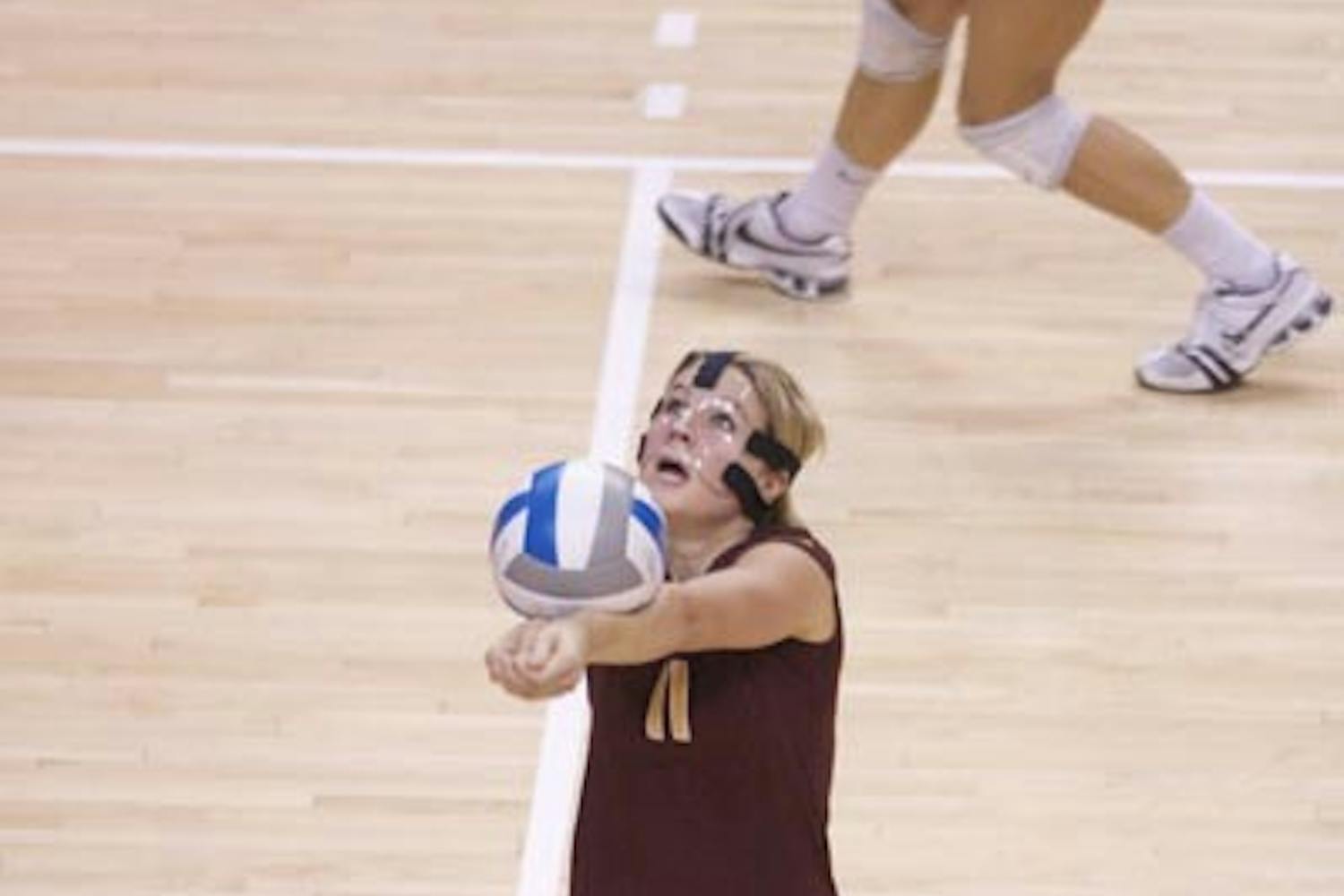 SMOOTH STRIKE: Senior libero Sarah Johnson bumps a volley during a conference match up with California earlier this season. The Sun Devils collected their first Pac-10 win Saturday with a win over Oregon State in five sets. (Photo by Scott Stuk)
