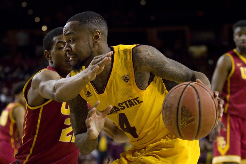 ASU senior guard Torian Graham (4) drives baseline during a men's basketball game against the University of Southern California Trojans in Wells Fargo Arena in Tempe, Arizona on Sunday, Feb. 26, 2017. ASU won 83-82.