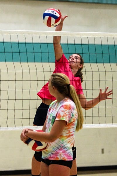 Arizona State club volleyball player Maddie Ternyik spikes the ball during practice at the Student Recreation Center on Nov. 17th, 2014.