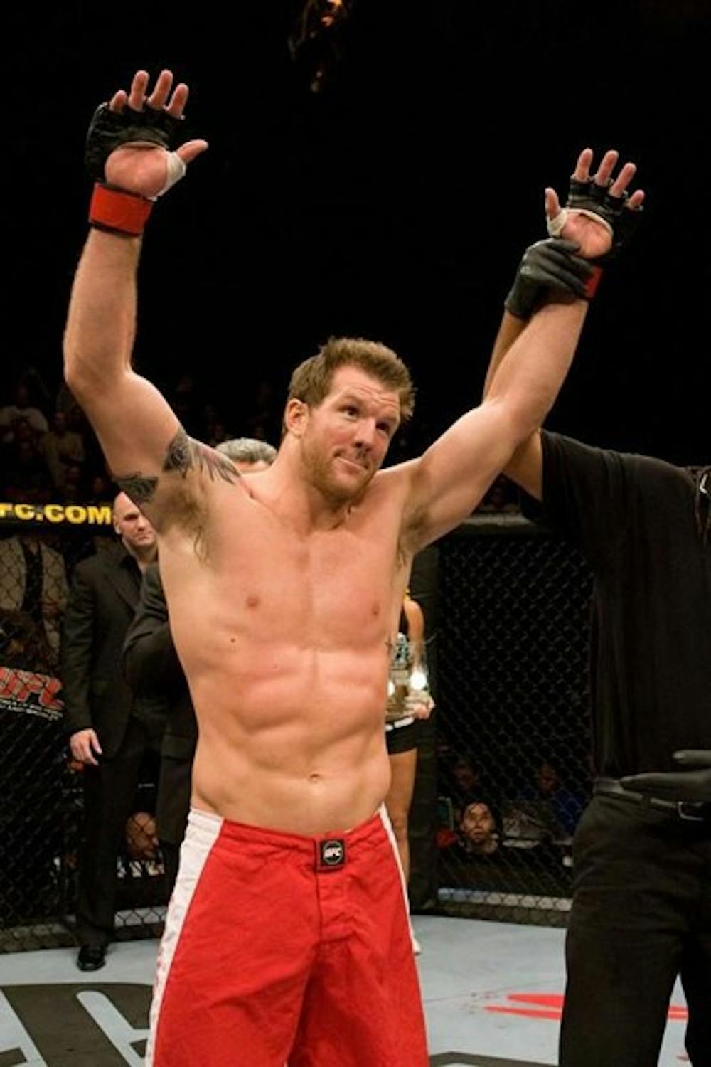 Ryan Bader raises his arms in celebration after a victory. Bader is one of several Sun Devils to make a name for himself in the world of MMA. (Photo courtesy of Ryan Bader)