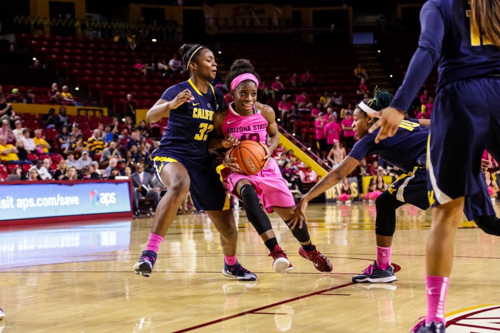 ASU senior guard Promise Amukamara looks to pass while driving down the lane vs. Cal women’s basketball at Wells Fargo Arena on Feb. 8, 2015. (Daniel Kwon/The State Press)