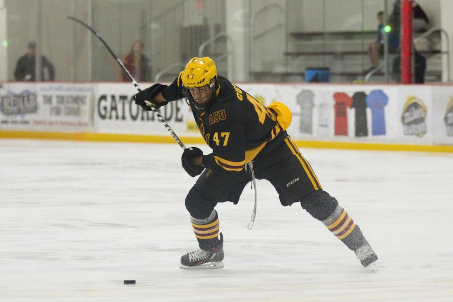 ASU sophomore right defender Nicholas Gushue (47, gold) looks to rip a shot during the annual Maroon and Gold Scrimmage at Oceanside Ice Arena, in Tempe, Arizona on Saturday, Oct. 1, 2016. The maroon team won 4-3 in overtime.