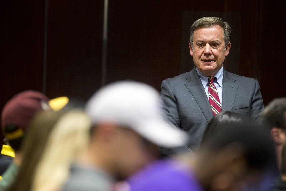 ASU President Michael Crow looks around the room after arriving to a student forum hosted by USG in the MU on Thursday, March 23, 2017. 