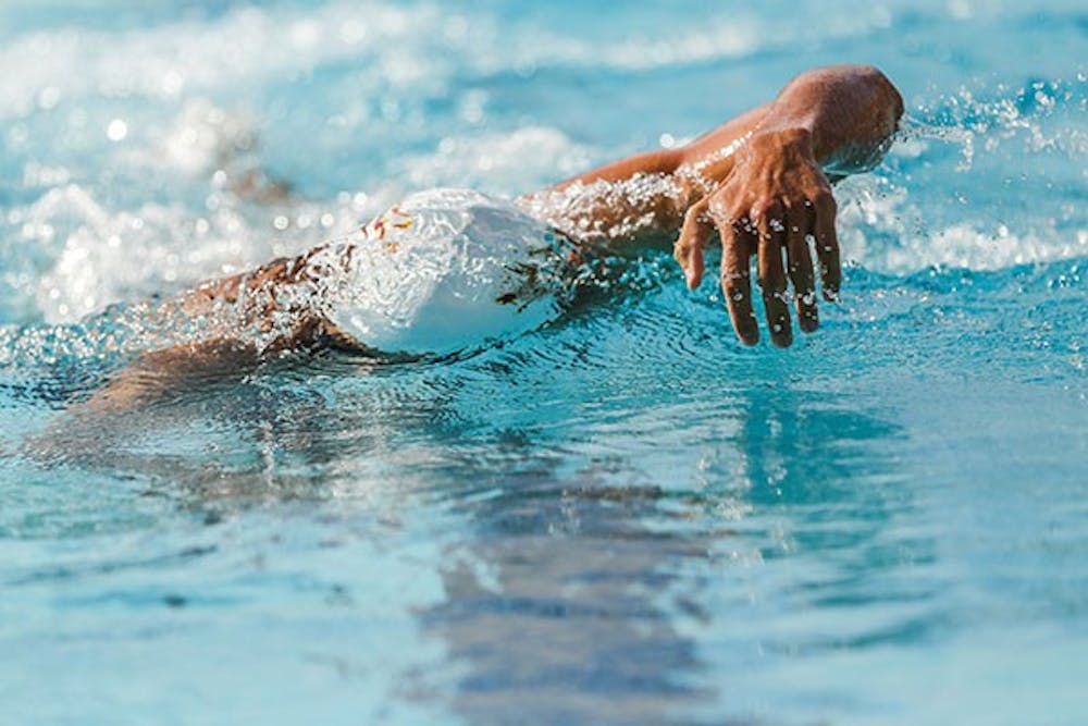 Senior Ryan Glander swims during the men's 1000 yard freestyle at a home meet in Tempe against USC. (Photo by Arianna Grainey)