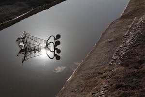 SUMMER DRIVE: A cart submerges itself in a ditch as the heat starts to build up in the valley. (Photo by Nikolai de Vera)