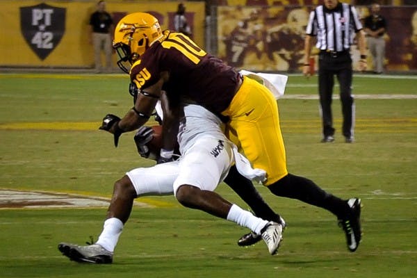 Junior cornerback Kweishi Brown tackles a Weber State player in a game at Sun Devil Stadium on Aug. 28. Coach Todd Graham said Brown and freshman Chad Adams are his two nickel backs. (Photo by Andrew Ybanez)