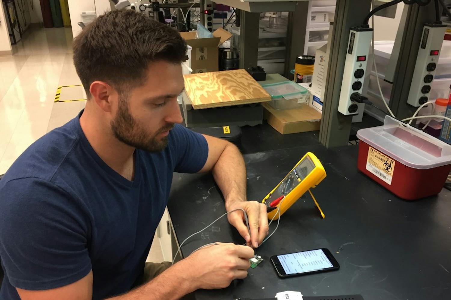 Kyle Mallires working on a PRISMS watch in Tempe, Arizona on April 17, 2017.