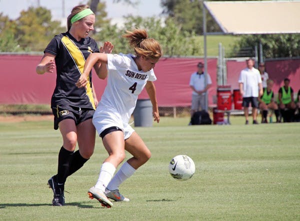 STEPPING UP: Freshman midfielder Jessica DeLeon shields the ball from her opposite number during the Sun Devils loss to Missouri on Sunday. DeLeon is expected to move into the starting lineup this weekend in Tucson. (Photo by Rosie Gochnour)