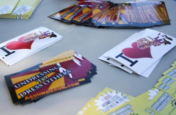 SHOWING SKIN FOR A CAUSE: Stickers and pamphlets were distributed around the ASU Tempe Campus last week to promote this Tuesday's "ASU Undie Run." The Undie Run is a charity event where students donate the clothes off of their bodies to the needy and participate in a run around campus in their underwear. (Photo by Lisa Bartoli)