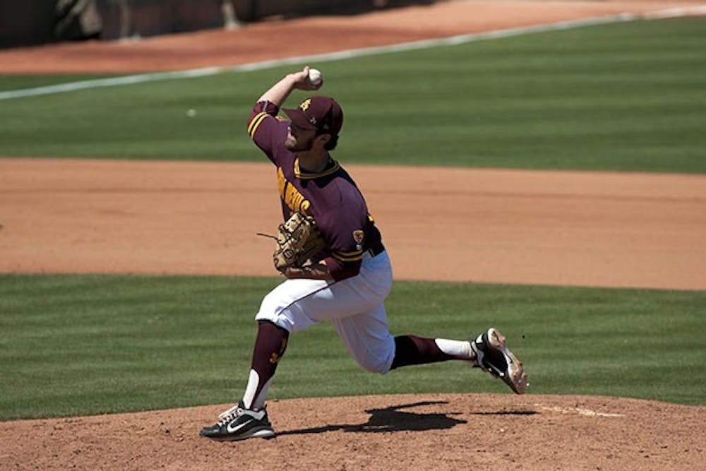 Sophomore righthanded pitcher Darin Gillies releases a pitch at a home game against California on April 13. (Photo by Mario Mendez)
