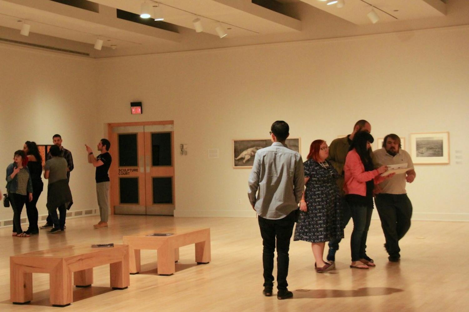 Participants in the "escape room" even&nbsp;try to find clues at the ASU Art Museum on Friday,&nbsp;March 31, 2017.