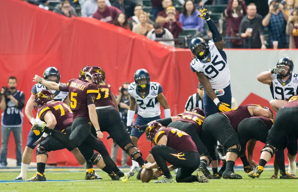 Junior place kicker Zane Gonzalez (5) kicks a field goal during the Motel 6 Cactus Bowl against West Virginia on Saturday, Jan. 2, 2016, at Chase Field in Phoenix.