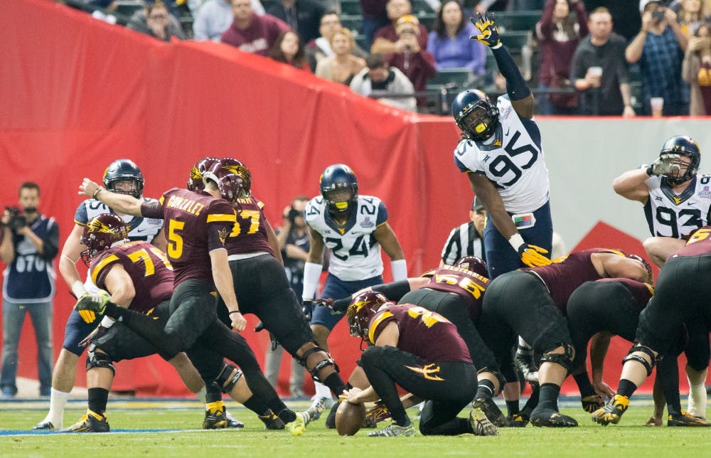 Junior place kicker Zane Gonzalez (5) kicks a field goal during the Motel 6 Cactus Bowl against West Virginia on Saturday, Jan. 2, 2016, at Chase Field in Phoenix.