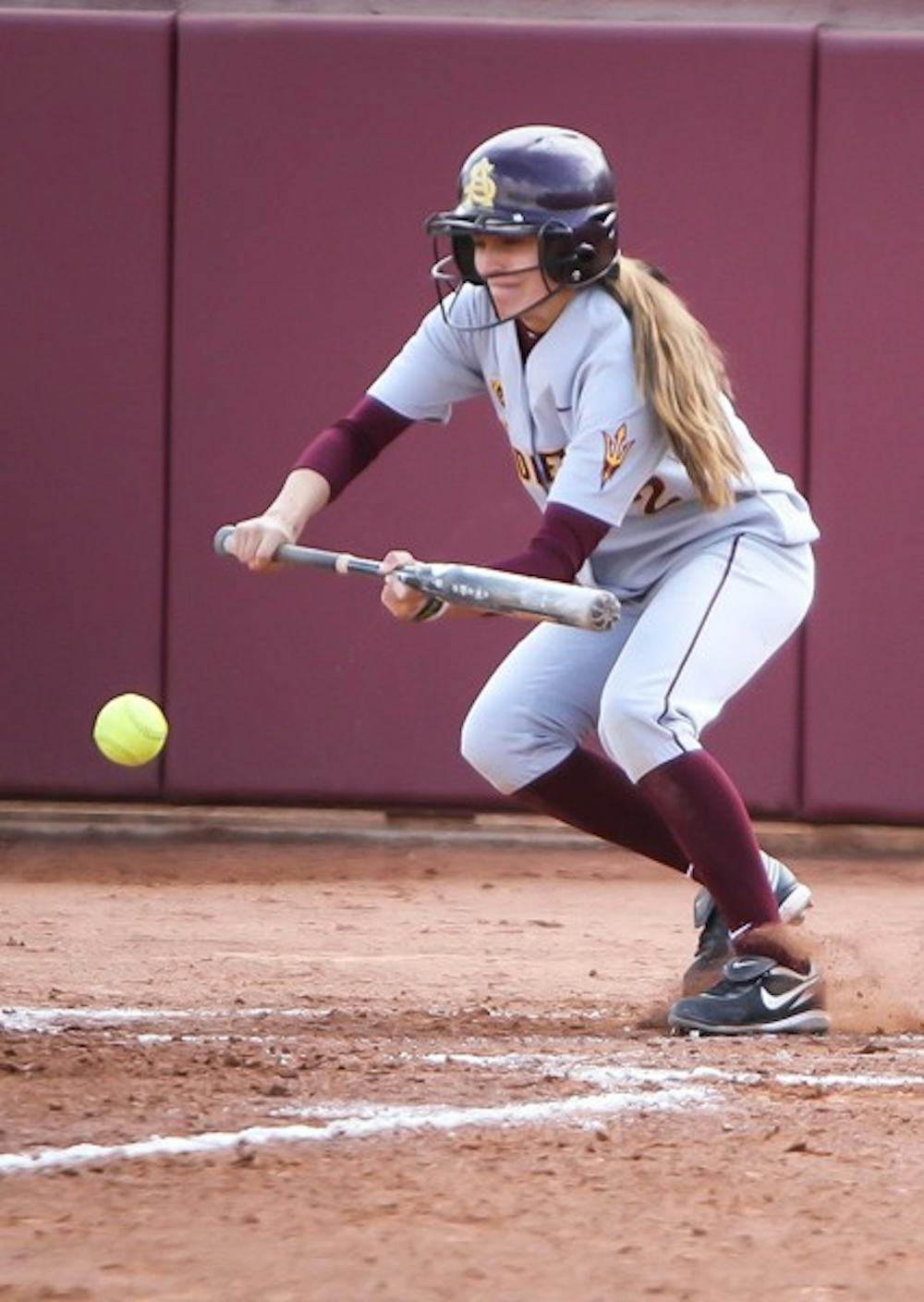 Junior outfielder Bailey Wigness bunts a ball during the Sun Devils' 3-0 win over Bradley on Feb. 10. Wigness will fill in for junior outfielder Alix Johnson, who has been suspended indefinitely for undisclosed reasons in ASU's home series against Washington this weekend. (Photo by Sam Rosenbaum)