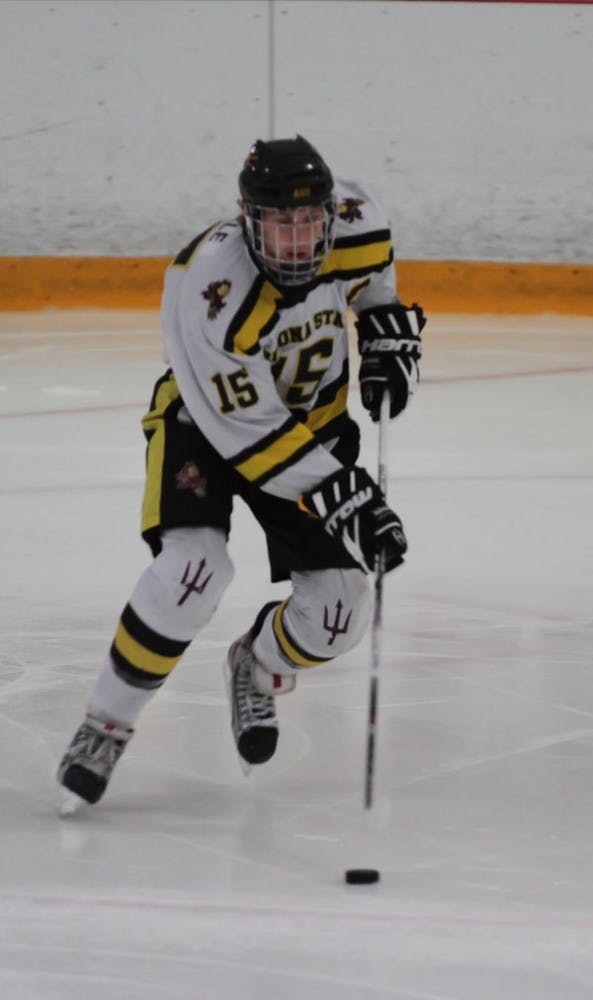 Forward Colin Hekle handles the puck during a game last season. After losing to Oakland in the postseason last year, the Sun Devils look forward to a return to the playoffs this season with the help of several new players. (Photo by Lisa Bartoli)
