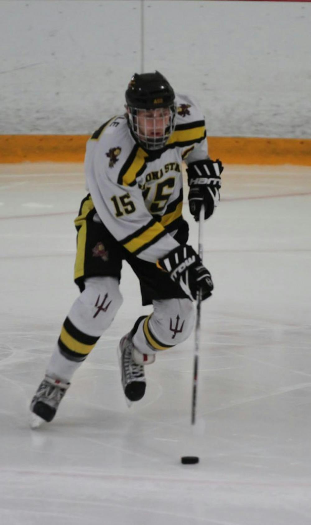 Forward Colin Hekle handles the puck during a game last season. After losing to Oakland in the postseason last year, the Sun Devils look forward to a return to the playoffs this season with the help of several new players. (Photo by Lisa Bartoli)
